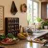 A neatly handwritten or printed weekly meal timetable pinned to a clean Nairobi kitchen wall next to a well-organised spice rack and fresh vegetables on the counter — representing a household that runs smoothly thanks to a clear, practical menu plan for the house help to follow
